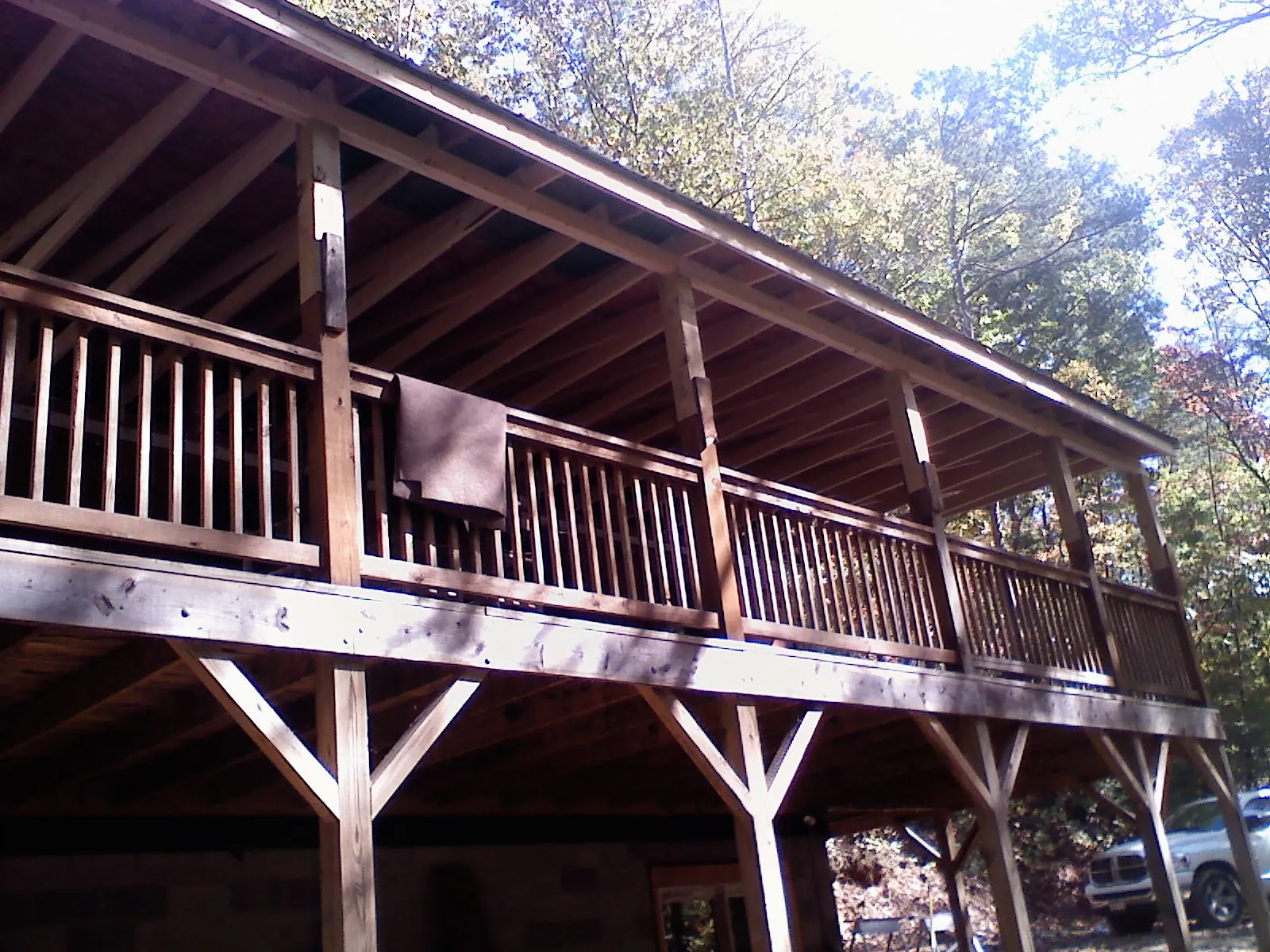Timber framing under a new elevated porch and deck — Roof Leak Repair in Norwalk by Roofing Brothers